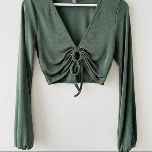 Crop top with long sleeves in shiny green US 2